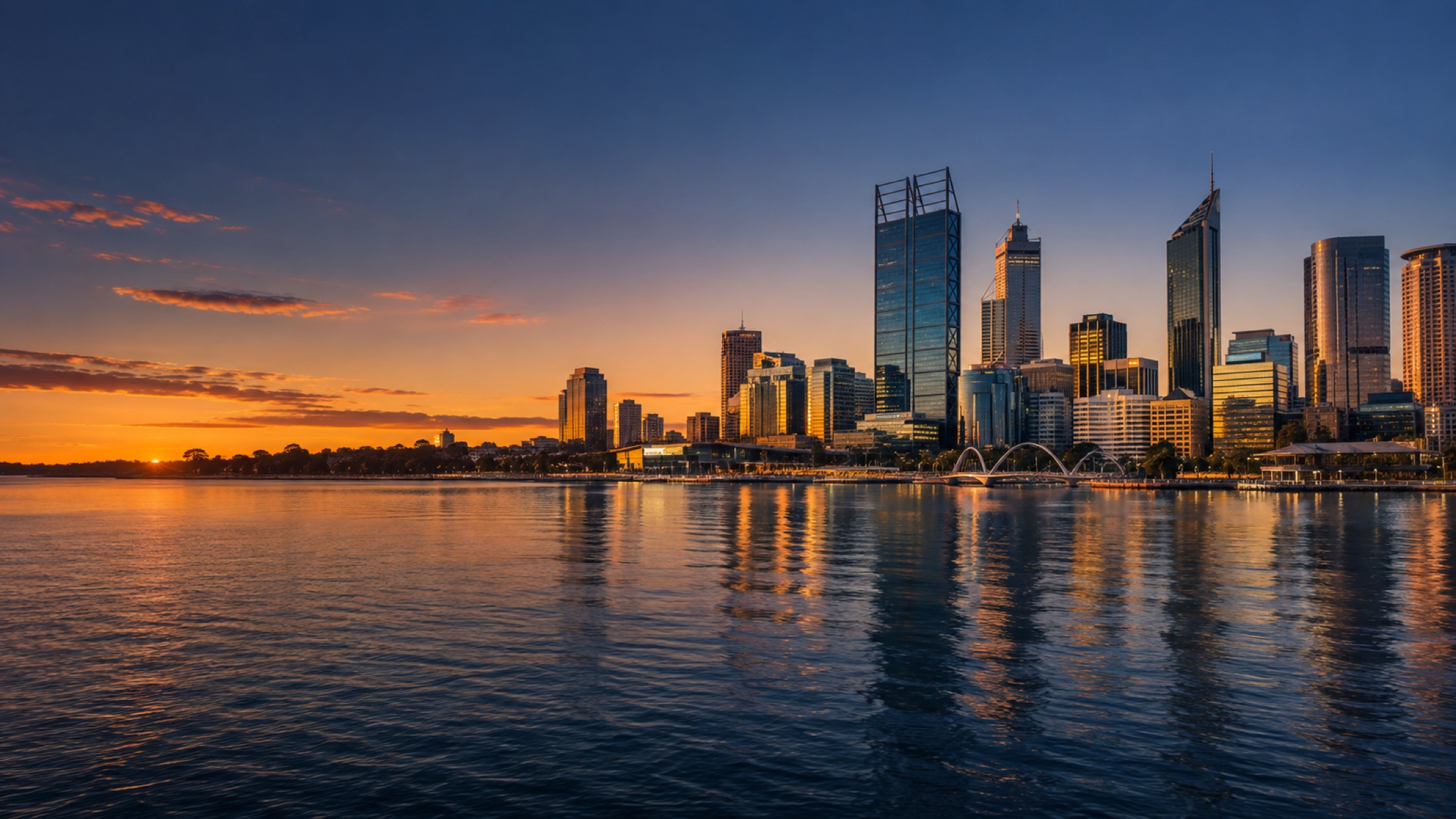 Perth skyline across the Swan River at golden hour